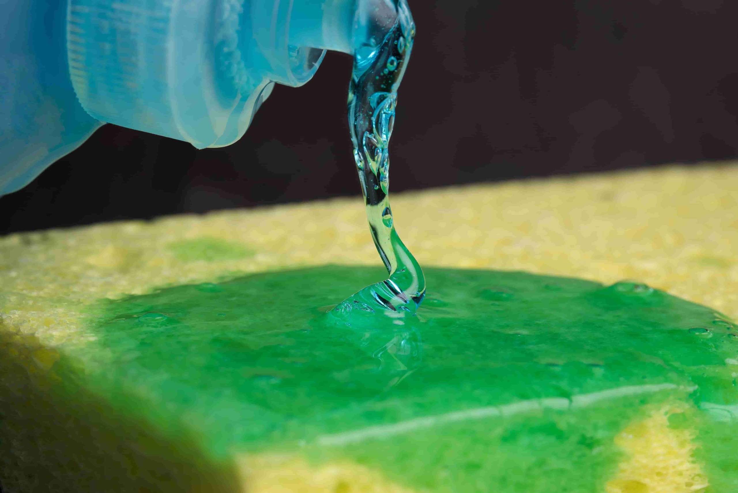 close up of dishwashing liquid being spread on cleaning sponge 750557307 5aeb6518c06471003646aefd 3 1 1 scaled
