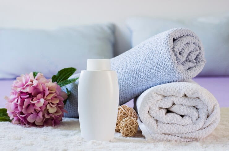 arrangement with towels bottle flower bed 23 2148296028 1