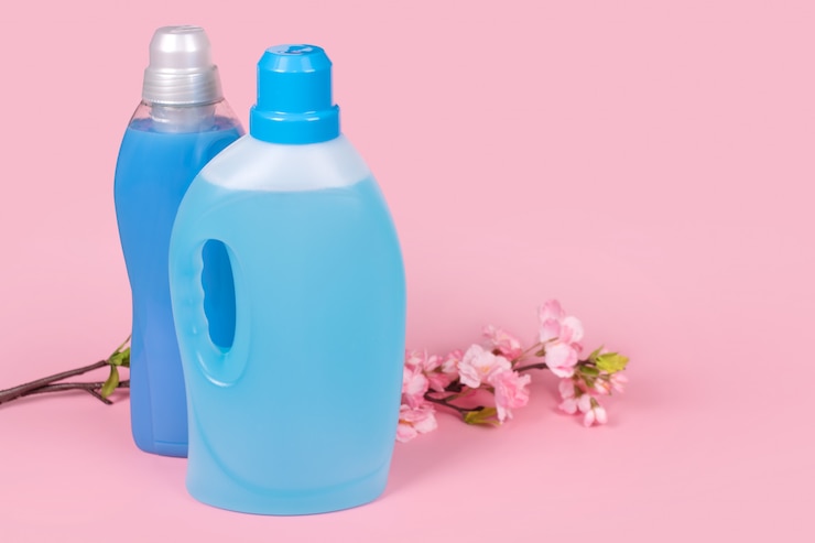 bottles detergent fabric softener pink background with flowers 99272 3303 2