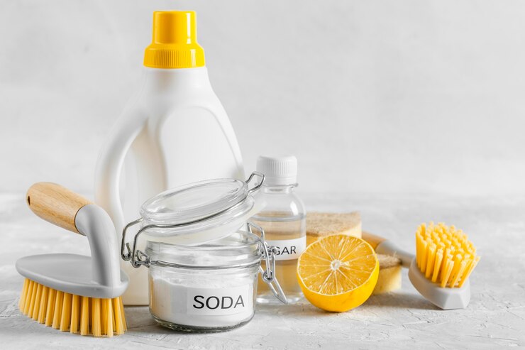 front-view-eco-friendly-cleaning-brushes-with-lemon-baking-soda_23-2148818474