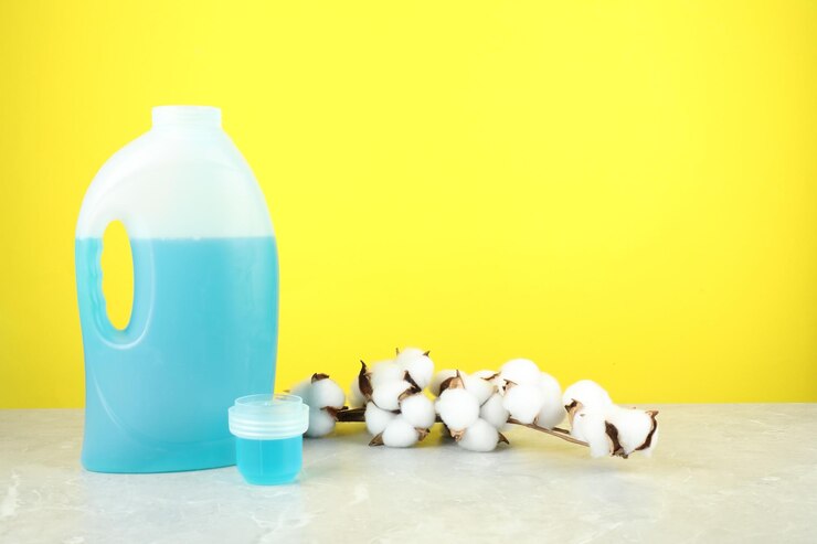 اطلاع از قیمت مایع لباسشویی لاوندر با عطر طبیعی 3 laundry detergent bottle cap cotton flowers grey marble table against yellow background 495423 113965