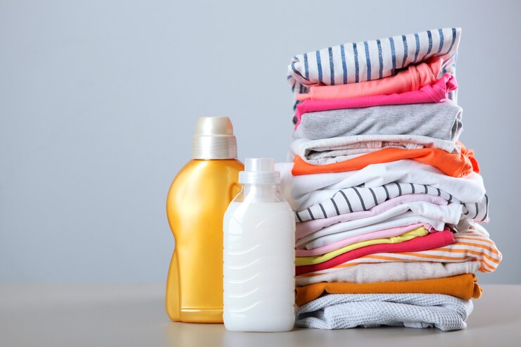 laundry detergent bottles clothes table household chemicals 441923 11