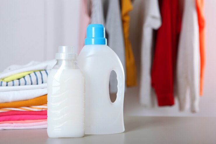 سفارش مایع لباسشویی ملایم بدون رایحه زننده 2 laundry detergent bottles clothes table household chemicals 441923 13306