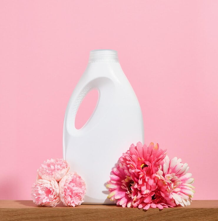 laundry detergent white clothes many colorful spring flowers pink background 594847 3542 1