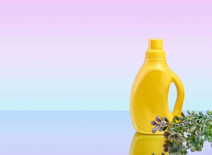 laundry-maid-concept-laundry-detergent-yellow-bottle-copy-space-text_594847-2612