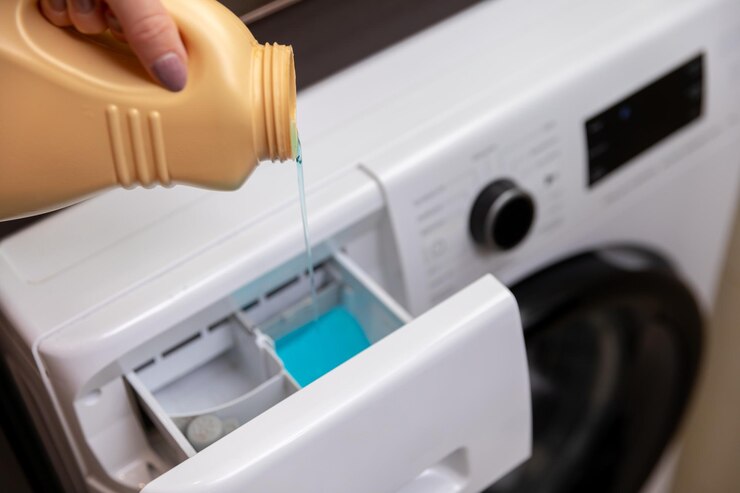 pouring-liquid-detergent-into-washing-machine-drawer-fresh-laundry-cycle_357949-8953