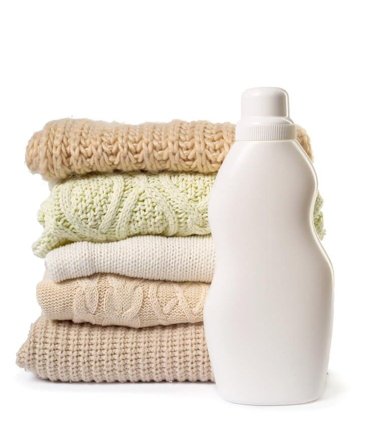 stack various sweaters isolated white background 1210371 2084 1 e1760017066559