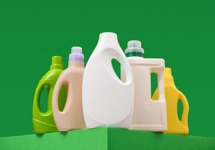 washing-powders-colorful-bottles-green-background-freshly-washed-laundry_594847-4179