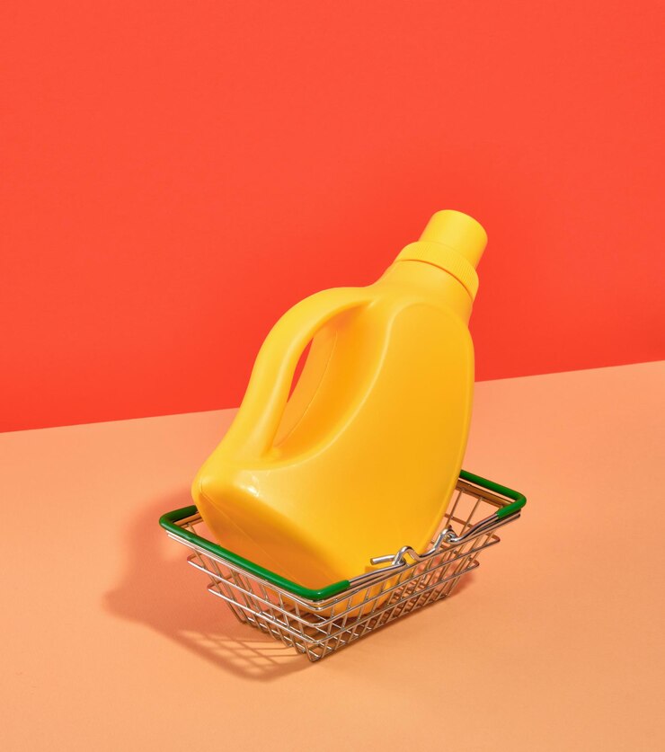 yellow-bottle-laundry-detergent-lies-metal-shopping-basket-copy-space-text_594847-5170