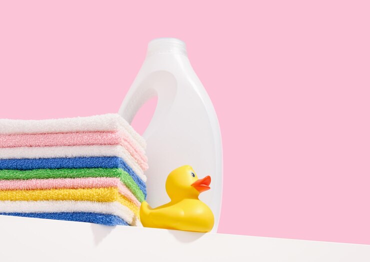 yellow-rubber-duck-laundry-detergent-clean-washed-colored-towels-copy-space-text_594847-7923 (1)